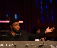 Andrae Crouch with Nicole Binion and Buddy Strong in the background