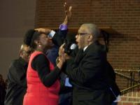 Bishop Thomas leads a powerful altar call