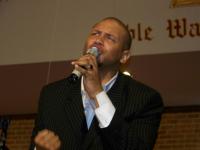 Byron Nickols leads the crowd to the next level of worship