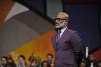 BeBe Winans listens as Marvin tells the stories of how The Winans met Andrae Crouch