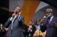 Marvin Winans and Donnie McClurkin in the moment of praise