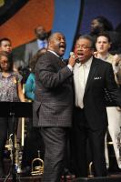 Pastor Marvin gets assistance from Howard Smith