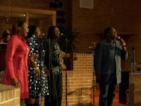 Hurd and company sings Lord I Lift Your Name On High