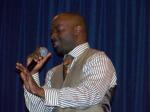 Myron Butler singing with passion