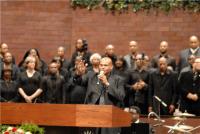 Pastor Larry Roberts and the Tribute Choir sing 