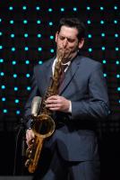 Saxophonist Steve Cole plays for the audience