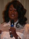 Brenda Jefferson shares her testimony at the album release party.